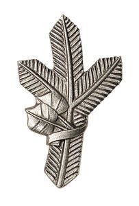 Badge on lapels - silver pine twig right